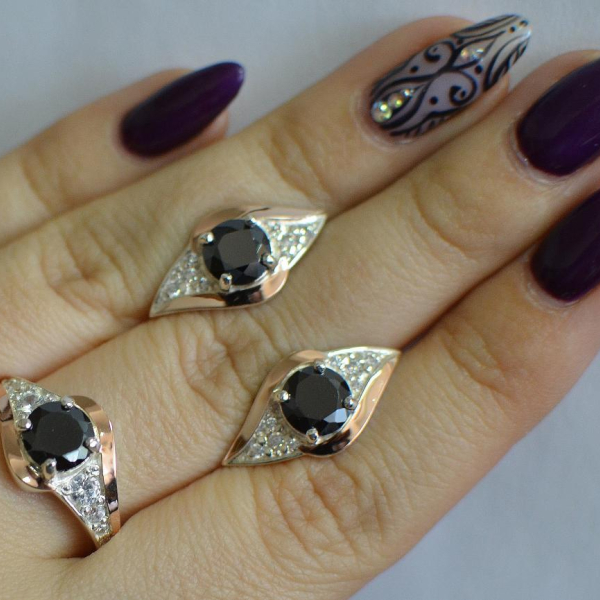 Срібний набір з золотими пластинами