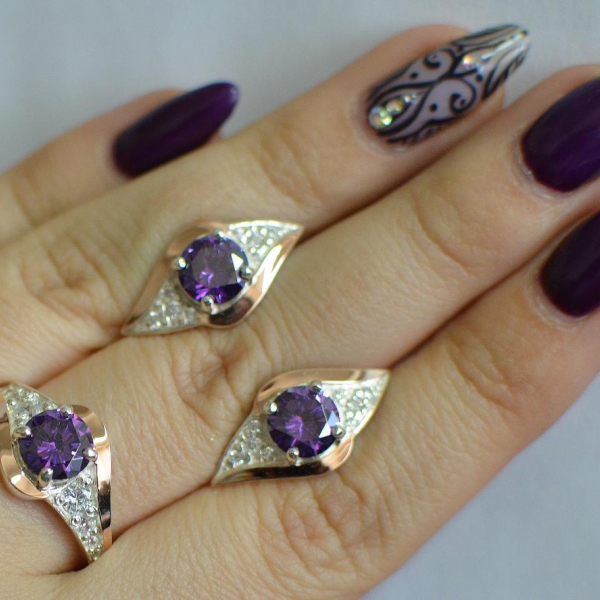 Срібний набір з золотими пластинами