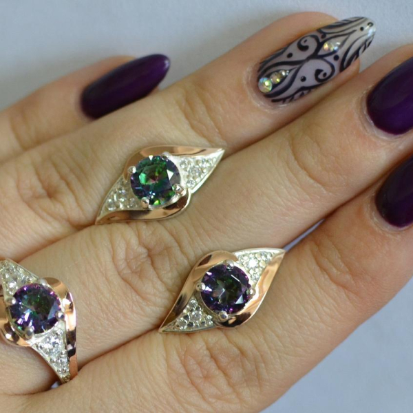 Срібний набір з золотими пластинами