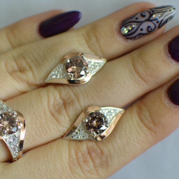 Срібний набір з золотими пластинами