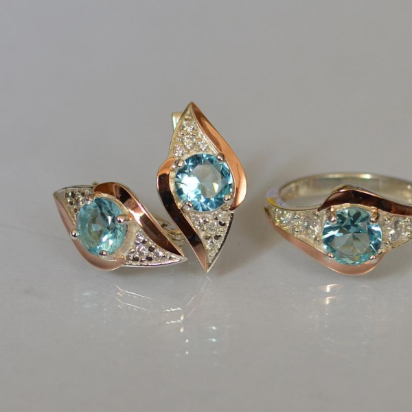 Срібний набір з золотими пластинами