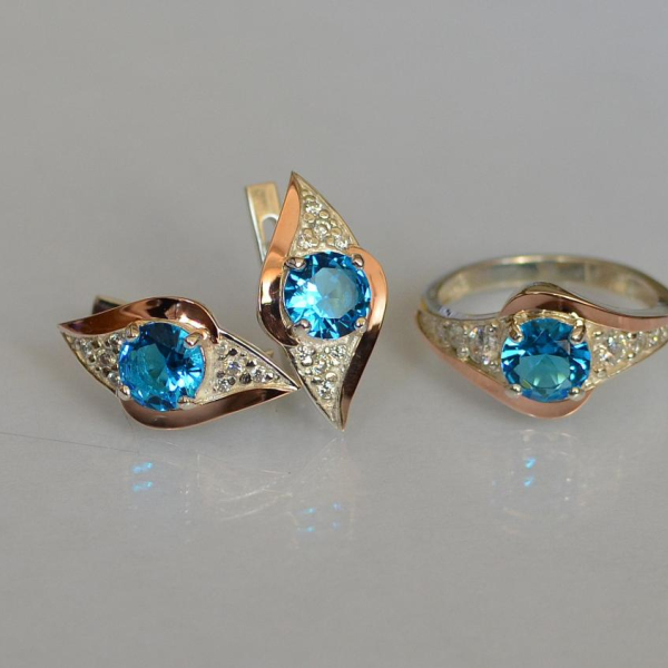 Срібний набір з золотими пластинами