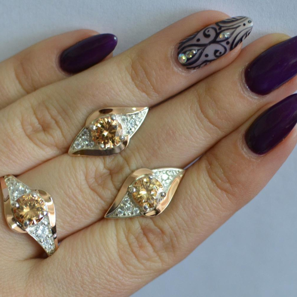 Срібний набір з золотими пластинами