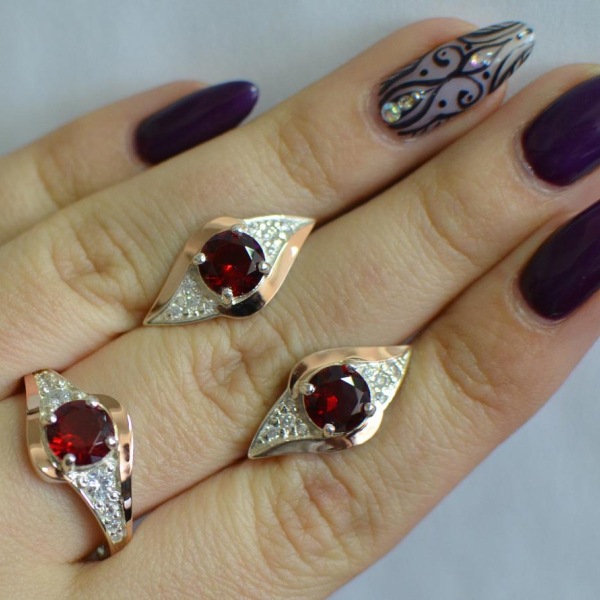 Срібний набір з золотими пластинами