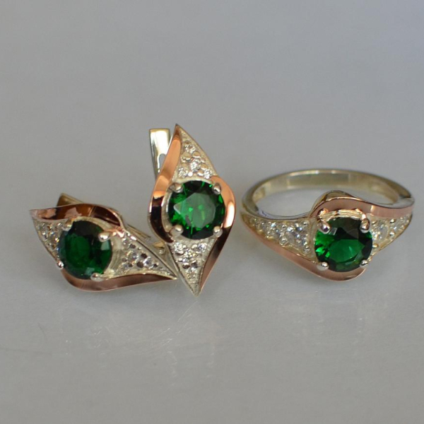 Срібний набір з золотими пластинами