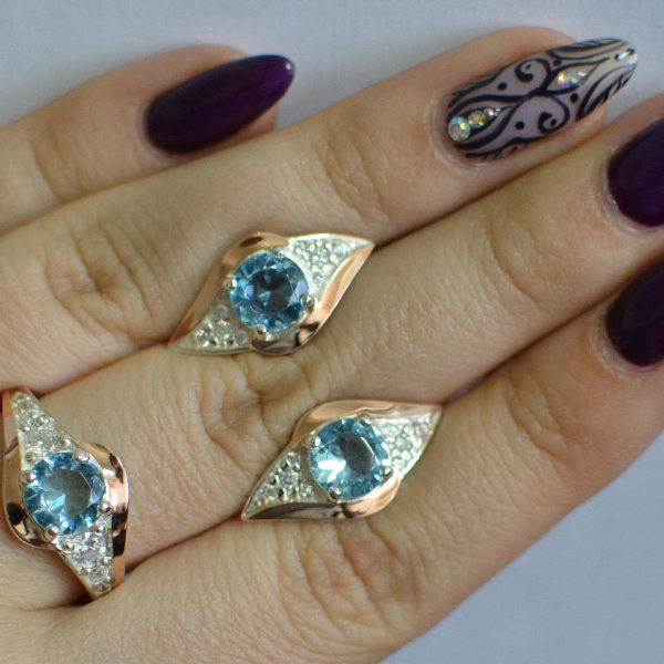 Срібний набір з золотими пластинами