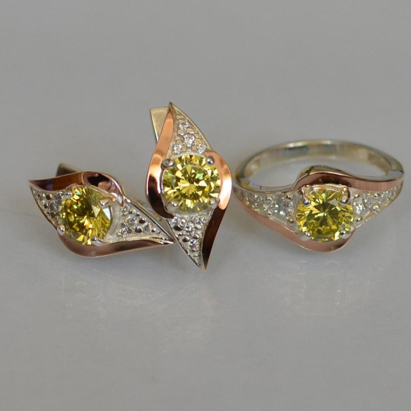 Срібний набір з золотими пластинами