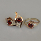 Срібний набір з золотими пластинами