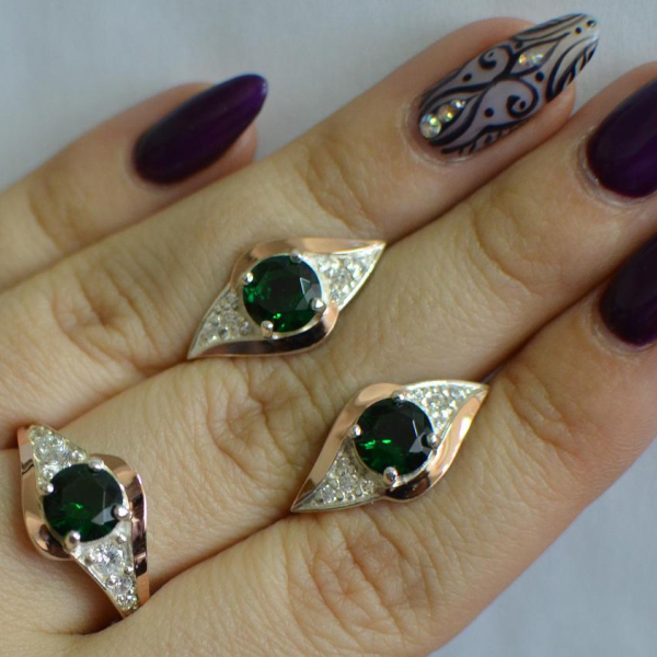 Срібний набір з золотими пластинами