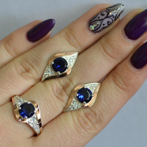 Срібний набір з золотими пластинами