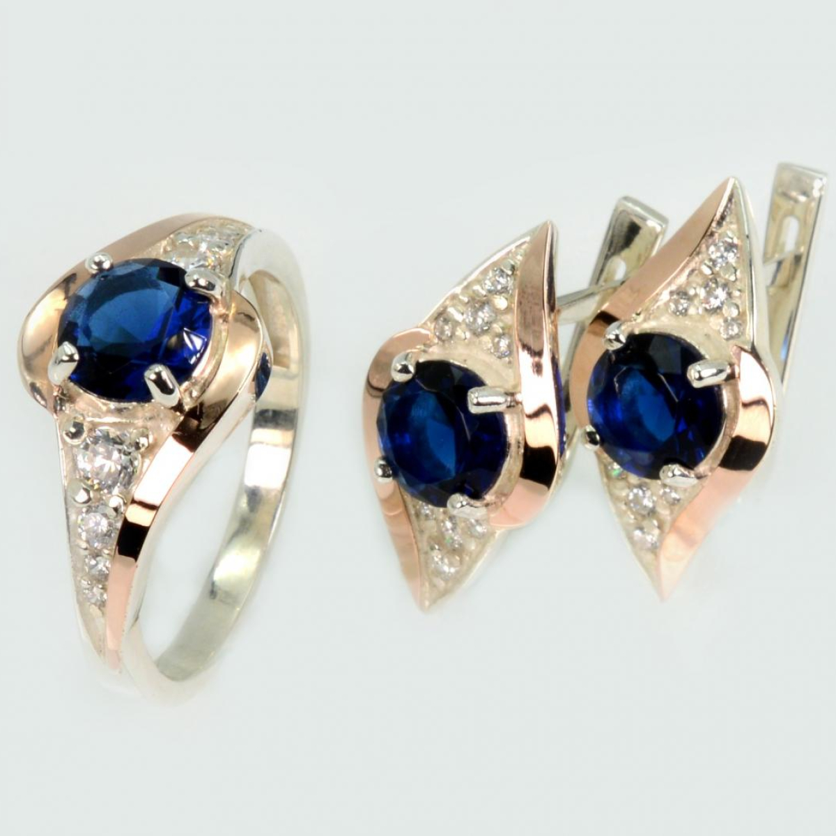 Срібний набір з золотими пластинами