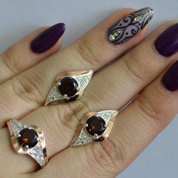 Срібний набір з золотими пластинами