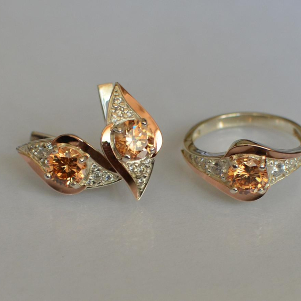 Срібний набір з золотими пластинами