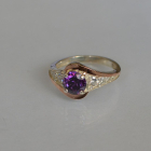 Срібна каблучка з золотими вставками