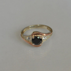 Срібна каблучка з золотими вставками