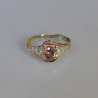 Срібна каблучка з золотими вставками