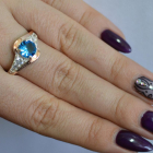 Срібна каблучка з золотими вставками