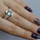 Срібна каблучка з золотими вставками