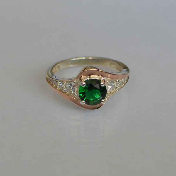 Срібна каблучка з золотими вставками