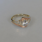 Срібна каблучка з золотими вставками