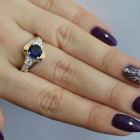 Срібна каблучка з золотими вставками