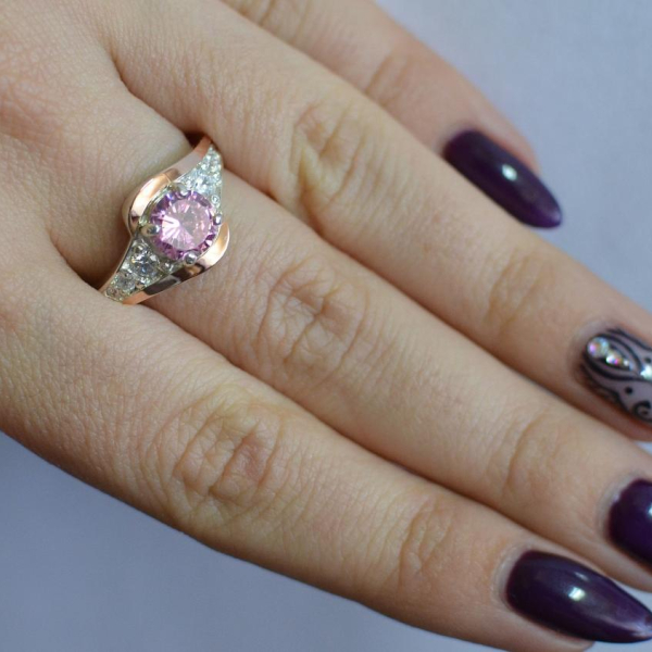 Срібна каблучка з золотими вставками