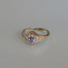 Срібна каблучка з золотими вставками