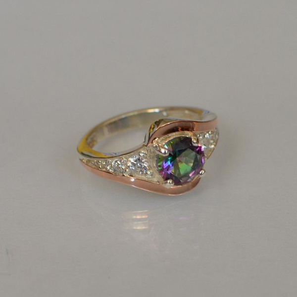 Срібна каблучка з золотими вставками