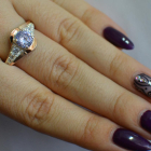 Срібна каблучка з золотими вставками