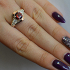 Срібна каблучка з золотими вставками