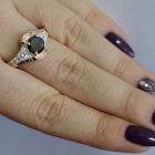 Срібна каблучка з золотими вставками