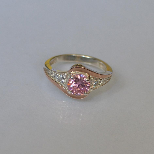 Срібна каблучка з золотими вставками