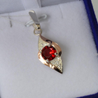 Срібна підвіска з пластинами золота