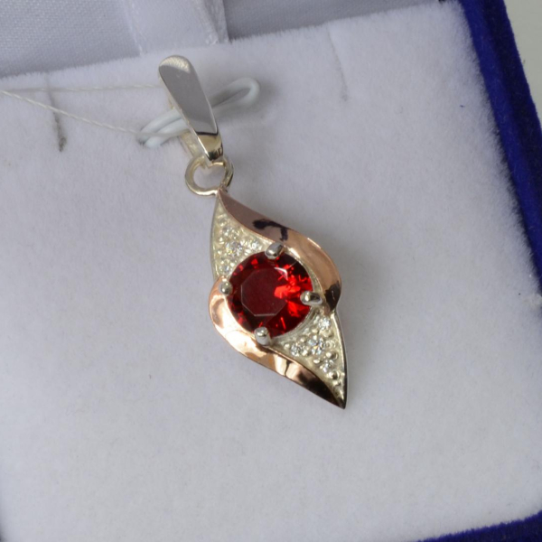 Срібна підвіска з пластинами золота