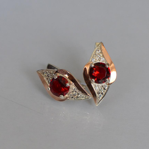 Срібні сережки з золотими вставками