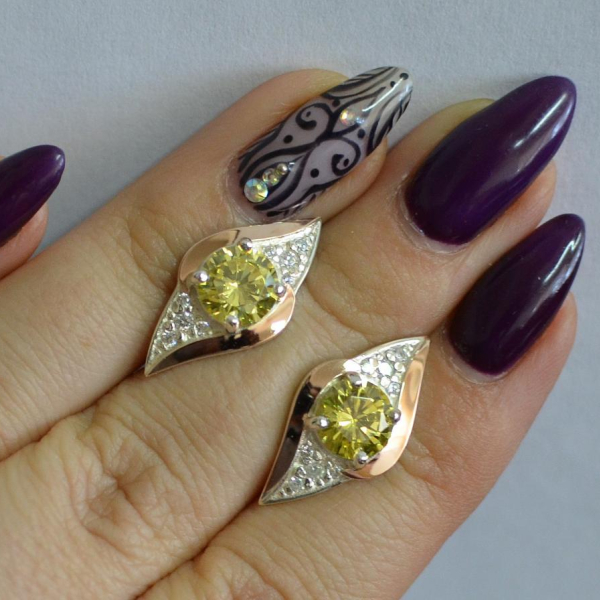 Срібні сережки з золотими вставками