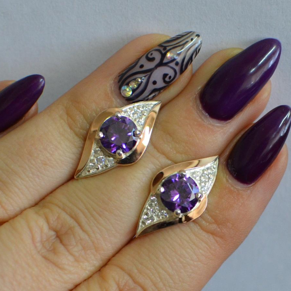 Срібні сережки з золотими вставками