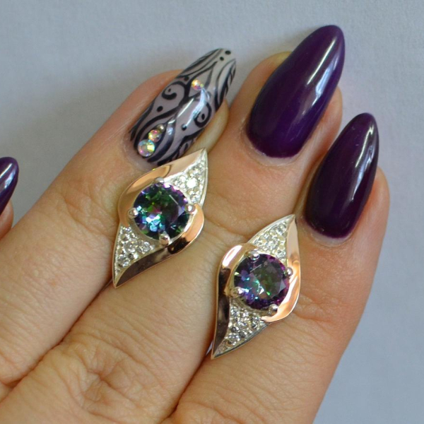 Срібні сережки з золотими вставками