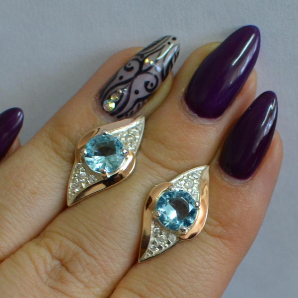 Срібні сережки з золотими вставками