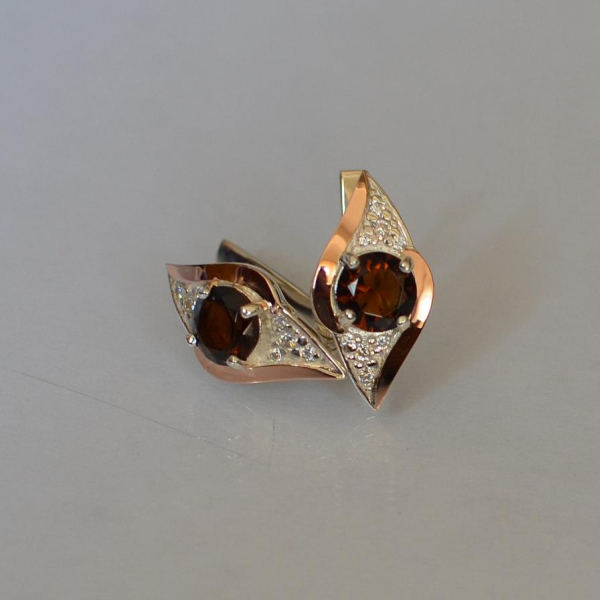 Срібні сережки з золотими вставками