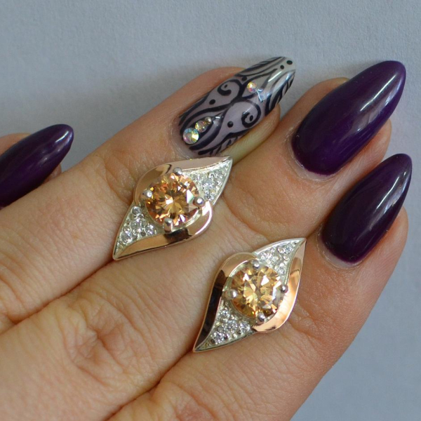 Срібні сережки з золотими вставками