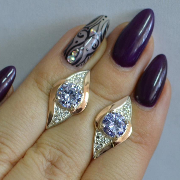 Срібні сережки з золотими вставками