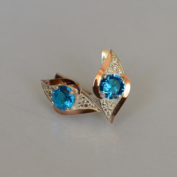 Срібні сережки з золотими вставками