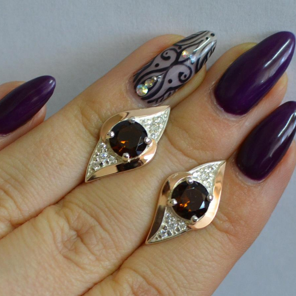 Срібні сережки з золотими вставками