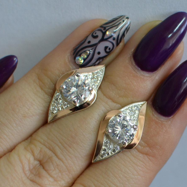 Срібні сережки з золотими вставками