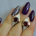 Срібні сережки з золотими вставками