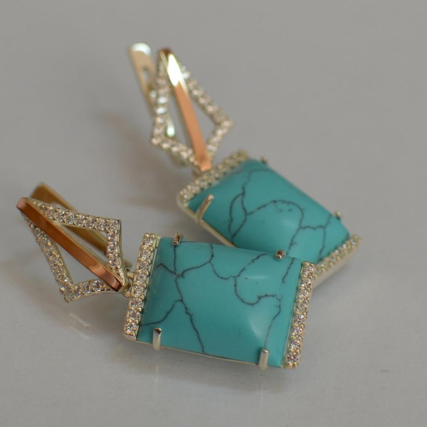 Срібні сережки з кабашонами