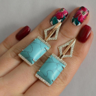 Срібні сережки з кабашонами