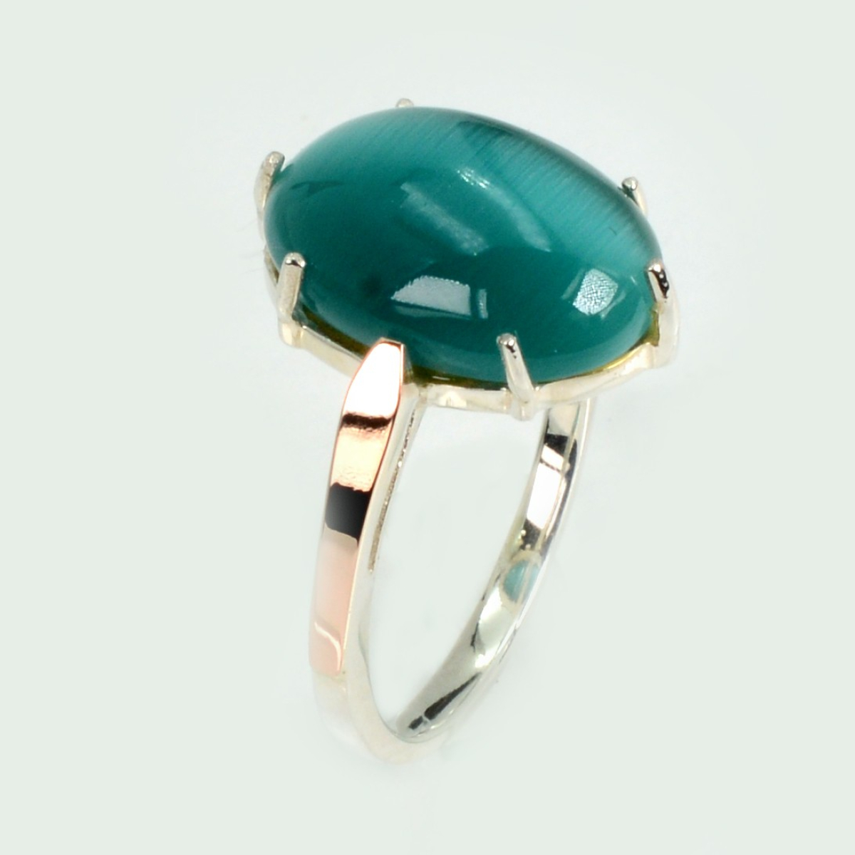 Срібна каблучка з золотими пластинами