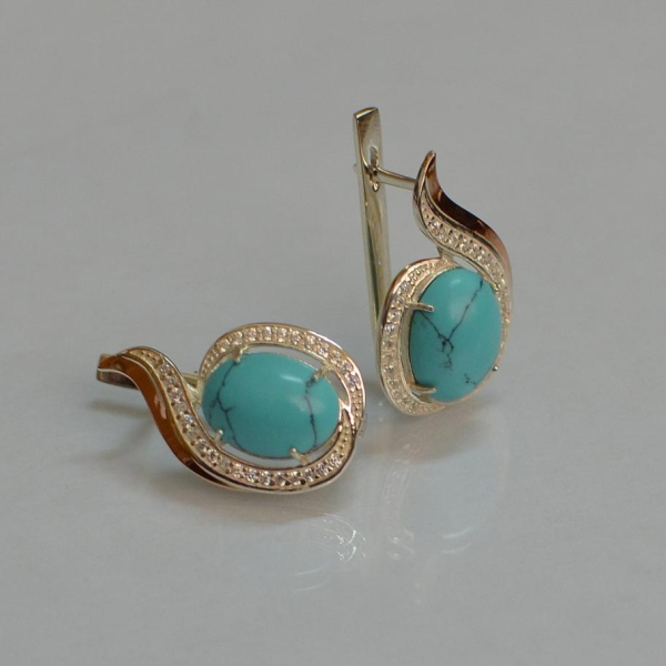 Срібні сережки з золотими вставками